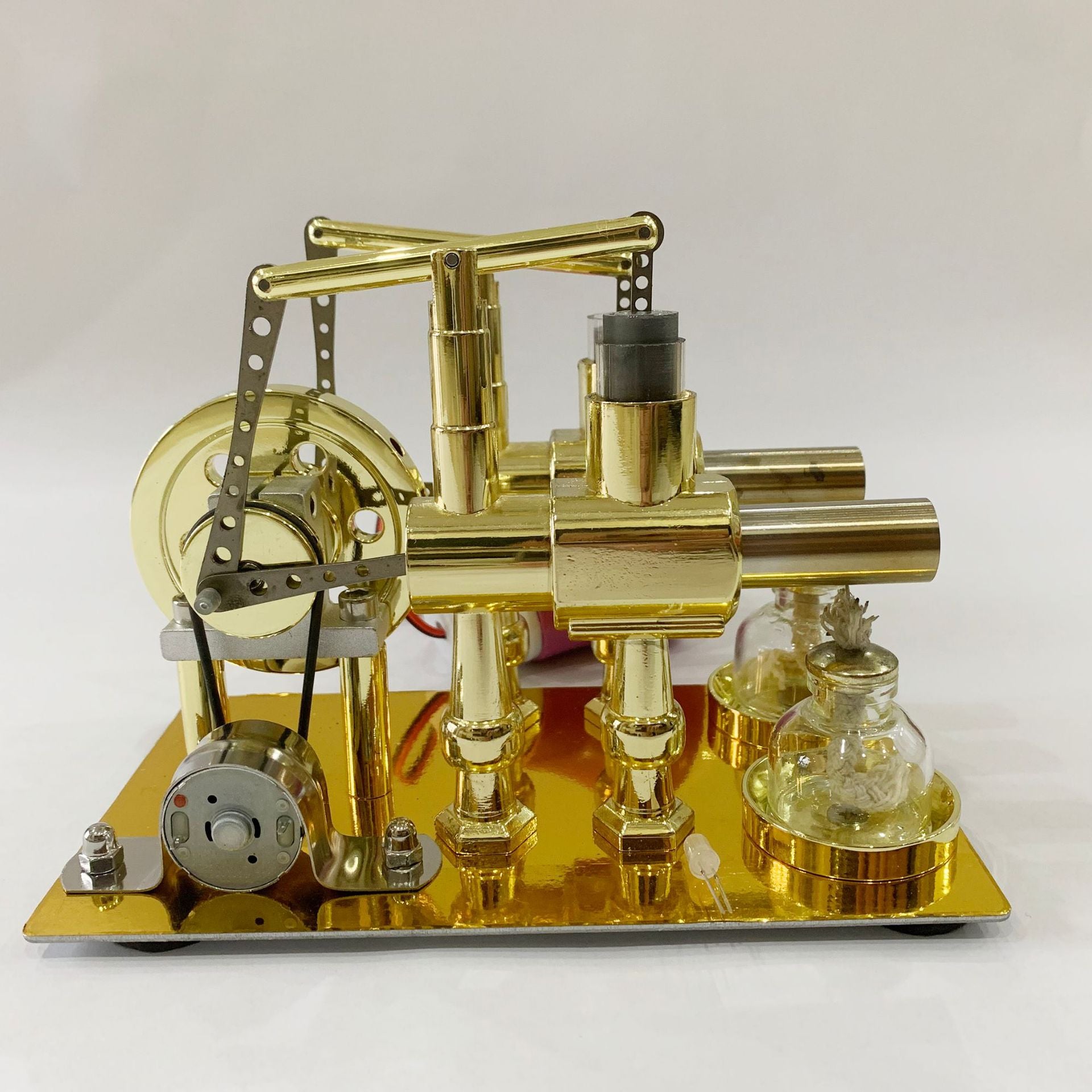 Stirling twin-cylinder engine generator steam engine physics experiments popular science science making DIY engine models